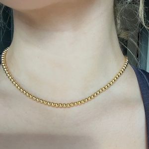 Gold beaded necklace
